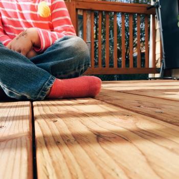 Sitting on wooden deck